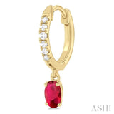 5x3 MM Oval Cut Ruby and 1/8 ctw Petite Round Cut Diamond Precious Fashion Huggies in 10K Yellow Gold